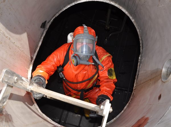 man in chemical suit